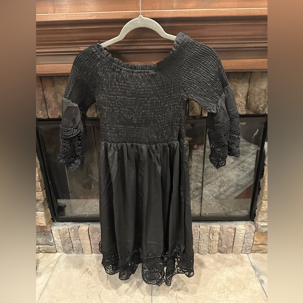 BEACHSISSI BLACK DRESS WITH LACE. Very stretchy and can be used as a coverup.